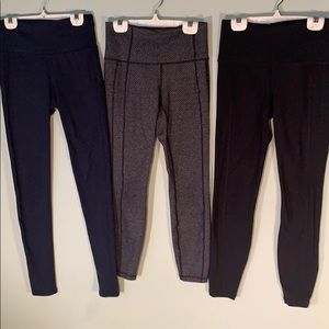 One set of 3 pairs of Athleta leggings! XS